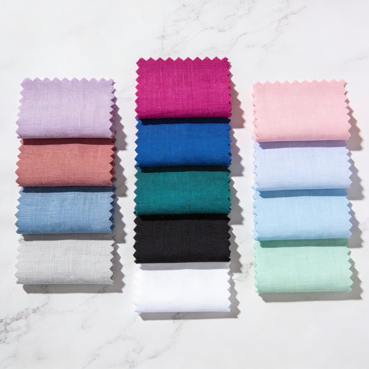 Échantillons de tissus représentant les trois saisons froides : Été Froid, Hiver Froid et Printemps Froid